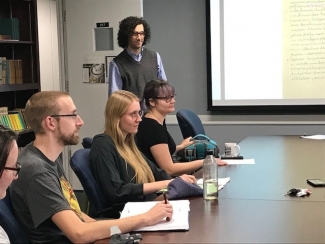 Dr. Joshua Bousquette leads a class discussion with graduate students at the University of Georgia.